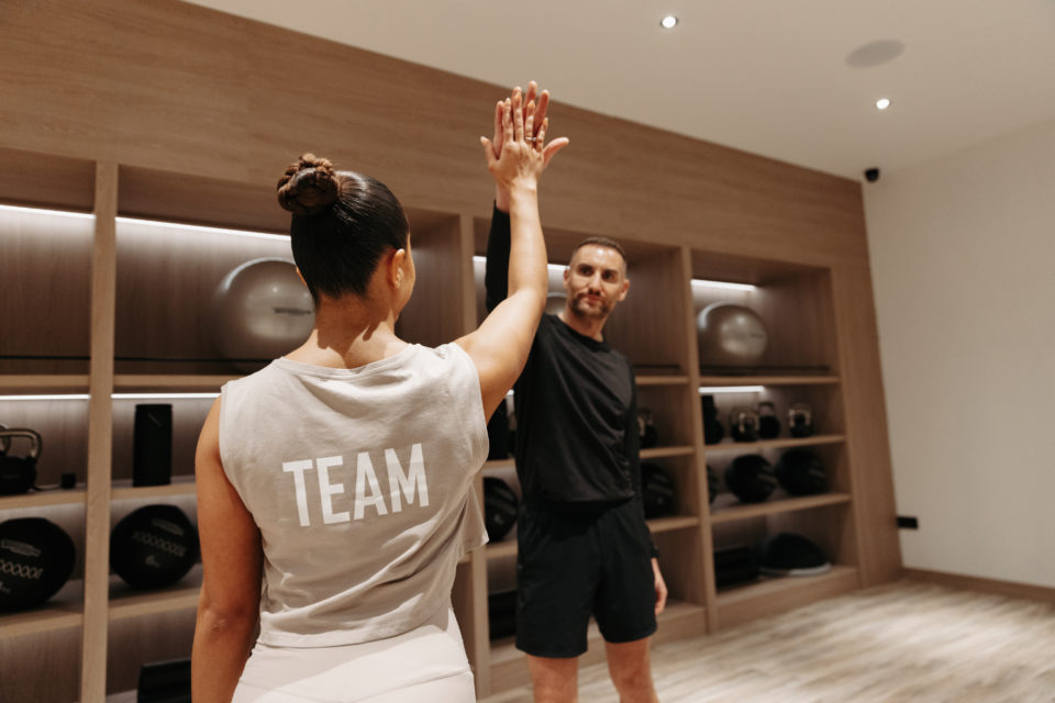 Lifestyle Image Hydro Health Club Female Male High Five